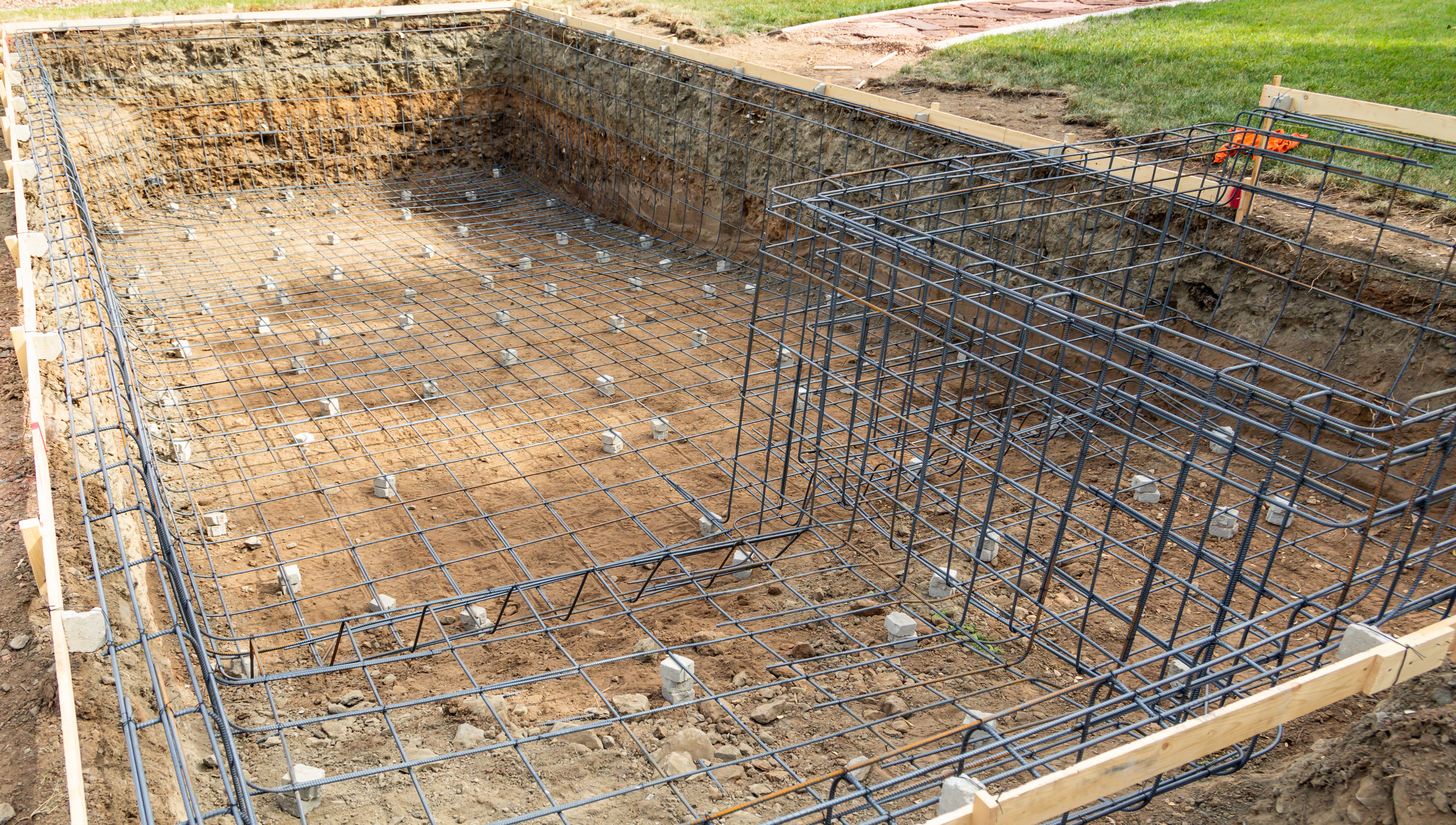 Besser block clearance pool construction